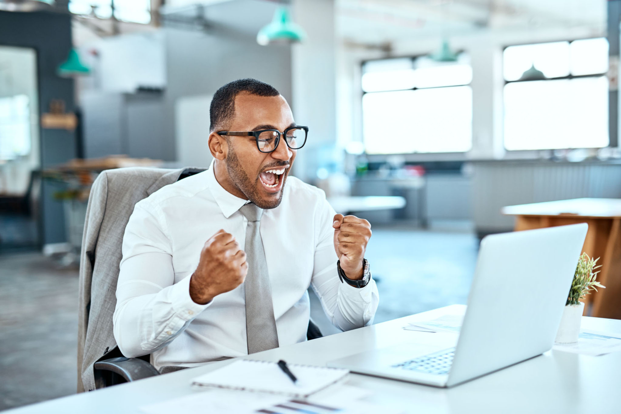 Person focused on a task, achieving a small win